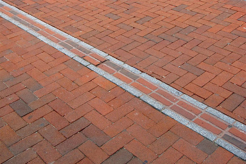 Freedom Trail brick line in sidewalk
